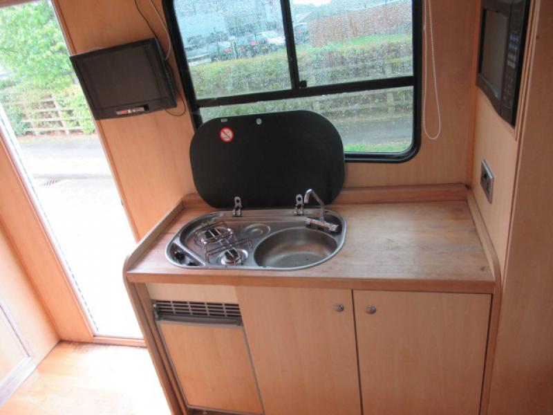 22-371-2005 DAF LF 150 7.5 Ton Coach built by McPhie coach builders. Stalled for 3 with smart living, toilet and shower.. Full tilt cab