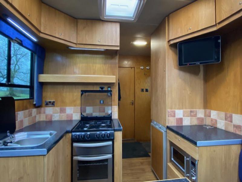 23-458-Beautiful Scania P 300 17,000 kg  Coach built by Empire Coach builders. Platinum Model. Stalled for 6. Smart luxurious living, sleeping for 4. Large bathroom with toilet and shower. Full tilt cab. Stunning truck!