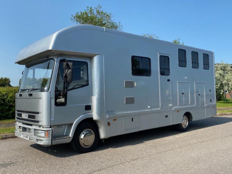23-560-Iveco Eurocargo 75E15 7.5 Ton Coach built by Highbarn Coach builders. Stalled for 3. Smart spacious living, sleeping for 4. Toilet and shower. External tack locker. Pristine condition throughout
