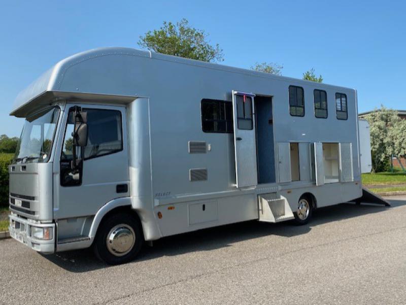 23-560-Iveco Eurocargo 75E15 7.5 Ton Coach built by Highbarn Coach builders. Stalled for 3. Smart spacious living, sleeping for 4. Toilet and shower. External tack locker. Pristine condition throughout