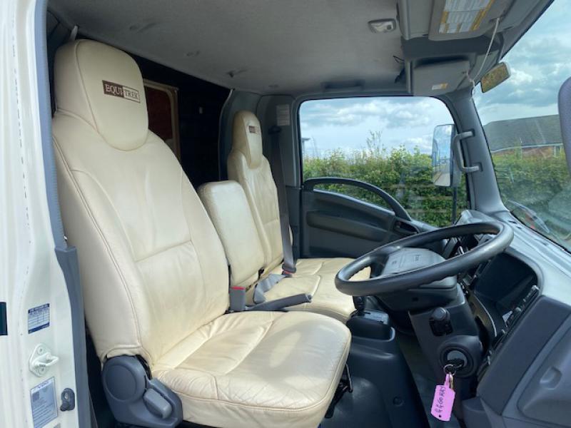 23-586-2011 Isuzu N75190 Automatic 7.5 Ton Equi-trek Endeavour elite with electric slide out. Stalled for 3. Smart luxury living, toilet and shower. Sleeping for 4. Horsebox from new